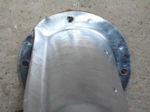 A galvanised shock turret where the bolt holes don't line up
