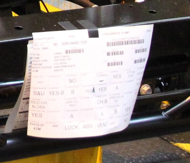 A Defender build sheet stuck to the front of the chassis